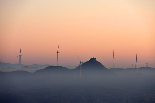 Wind power plants in the morning.