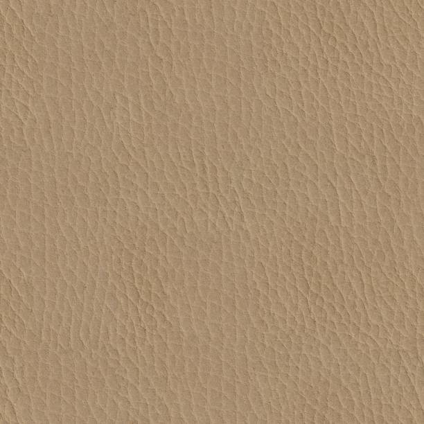istock Close up of a beige leather texture. Seamless square background 872768522