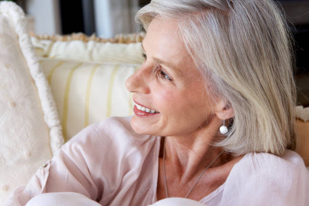 istock Close up attractive older woman smiling 872772712
