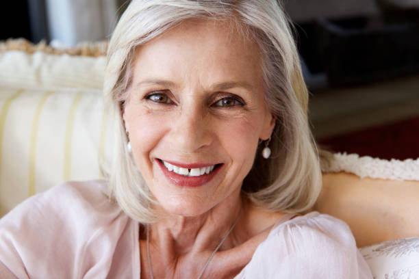 istock Close up beautiful older woman smiling 872772922