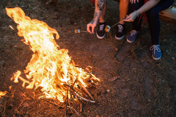 istock Picnic couple tourism bonfire concept. 872776034