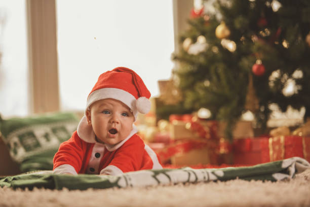 istock Baby in Santa Claus costume 872791396