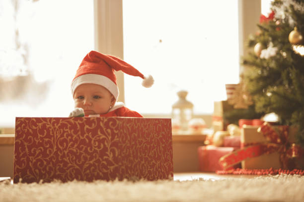 istock Baby boy playing in a box 872791466