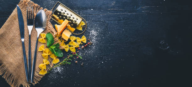 Cooking. Italian cuisine. Top view. Free space for text. On a wooden background.