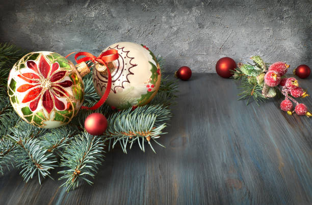 istock Christmas arrangement in green, red and white on rustic wood 872797402