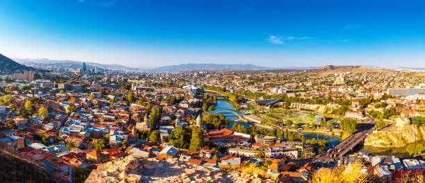 tourustic ride on the funicular, aerial view from the top on the houses with traditional wooden carving balconies of old town of tbilisi, georgia - kura river imagens e fotografias de stock