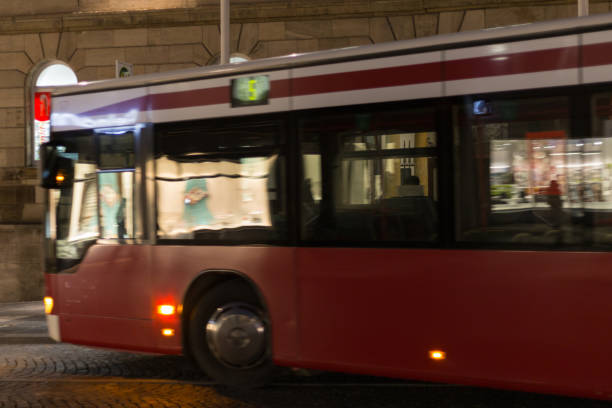 istock local public transport at night with citylights 872800202
