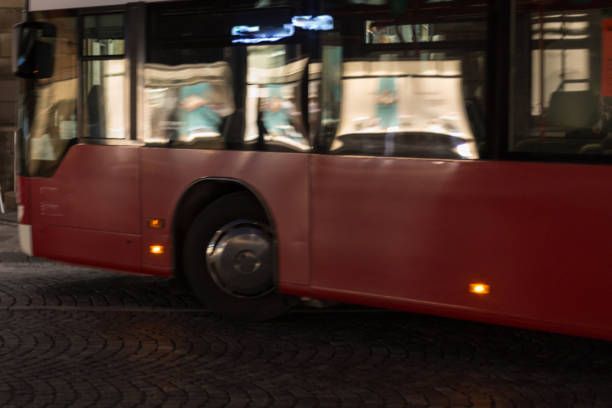 istock local public transport at night with citylights 872800248