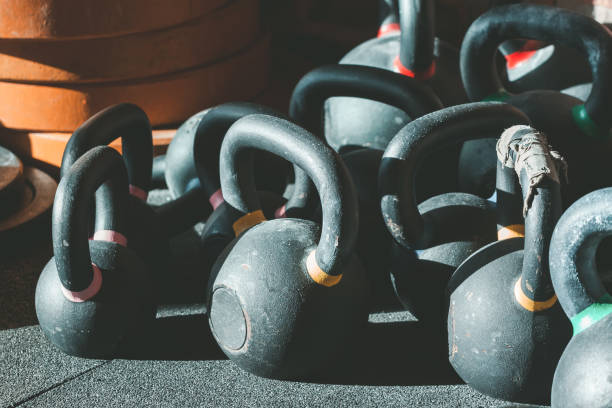 istock Gym. Kettlebell and barbell weights. 872806816
