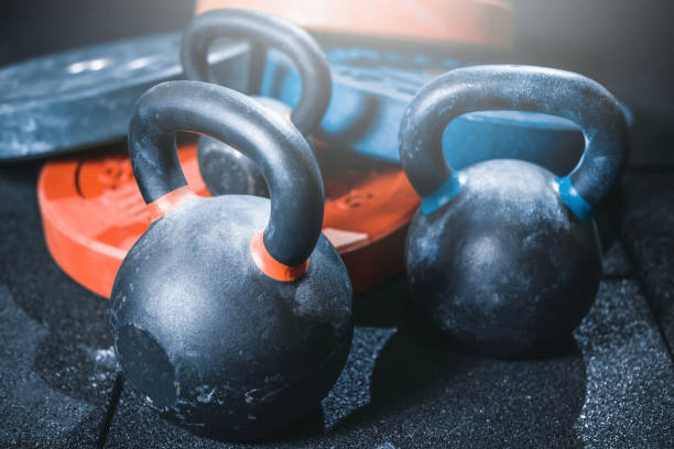 istock Gym. Kettlebell and barbell weights. 872806842