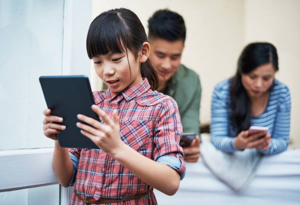 istock They all love their own gadgets 872814942