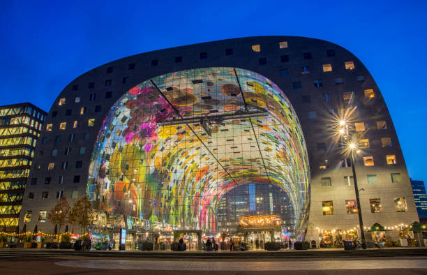 Market Hall The Markthal is a residential and office building with a market hall underneath, located in Rotterdam market hall stock pictures, royalty-free photos & images
