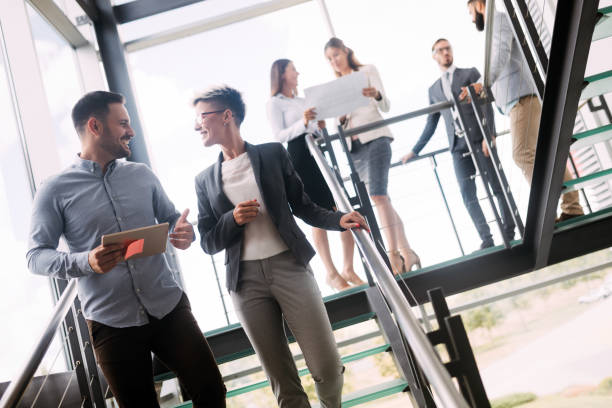 istock Picture of architects talking about project in hall 872819170
