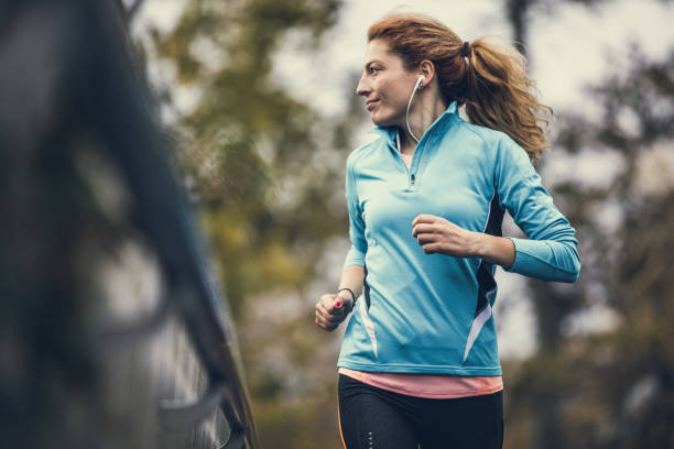 istock Female Athlete Running Outdoors 872821500