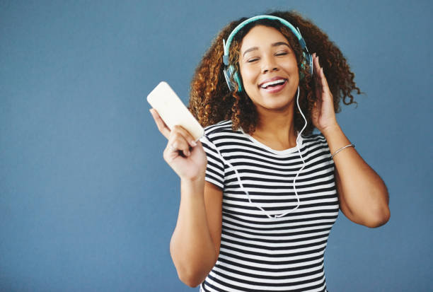 istock Listening to my feel-good playlist 872821736