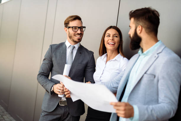 istock Group of perspective designers discussing in office 872824860