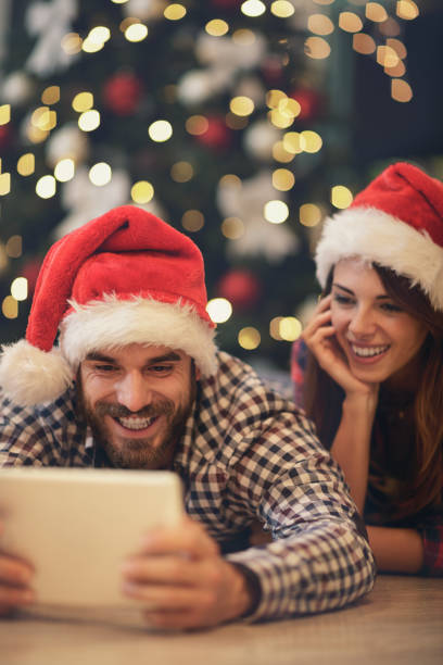istock Couple having fun for Christmas 872825948