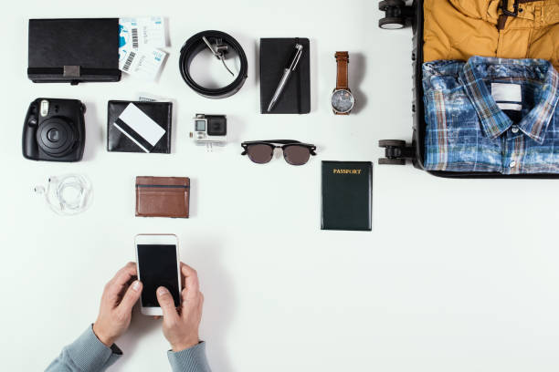 istock Man booking his flight online and getting ready for his holiday 872828206