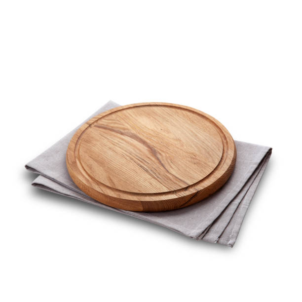 istock Board for pizza on tablecloth  isolated. top view mock up 872831792