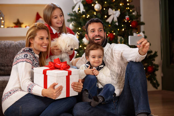 istock Family making selfie with cell phone for Christmas 872832850
