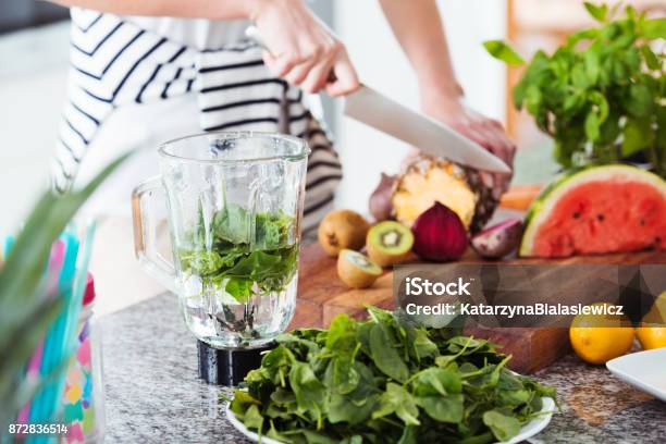 Person Preparing Coctail With Rucola Stock Photo - Download Image Now - Detox, One Woman Only, Adult