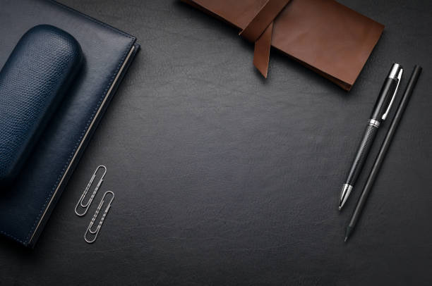 istock Office leather desk table with cover for glasses, supplies and notebook 872836768