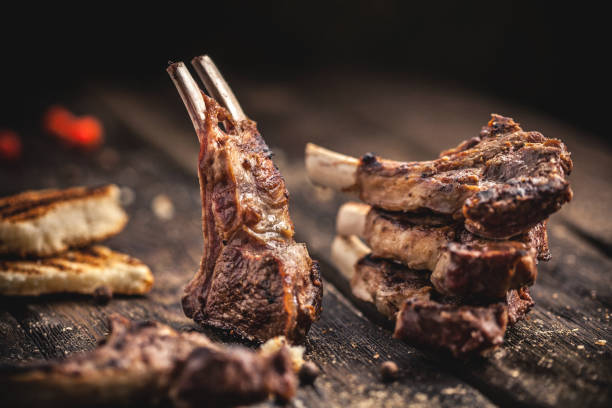 istock Grilled lamb chops on wooden table 872840784