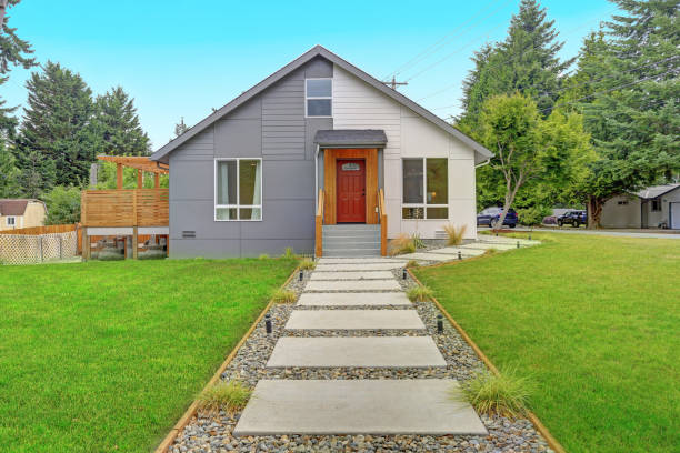 istock Nicely renovated grey and white home exterior 872846178