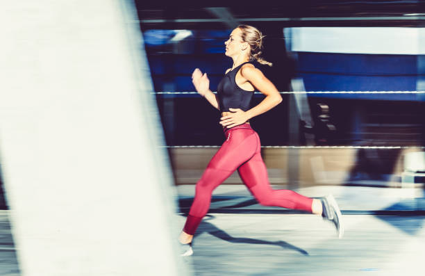 istock Female Athlete Running Outdoors 872846218