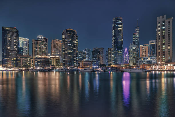 istock Promenade and canal in Dubai Marina 872849172