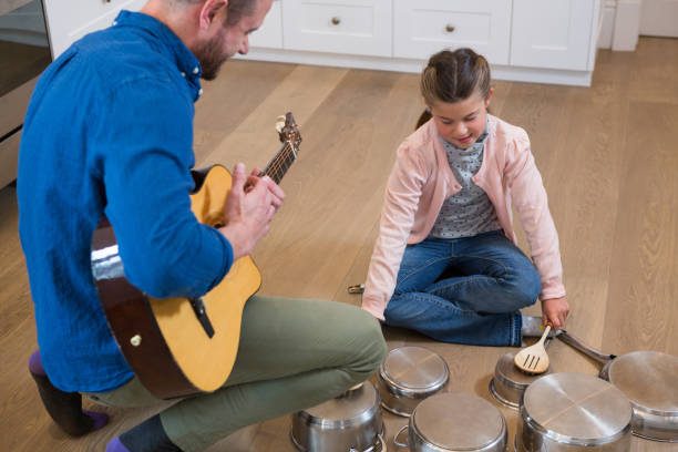 istock Father and daughter enjoying in kitchen 872852468