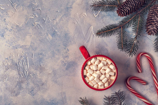 istock Christmas background with hot chocolate and marshmallow. 872853012