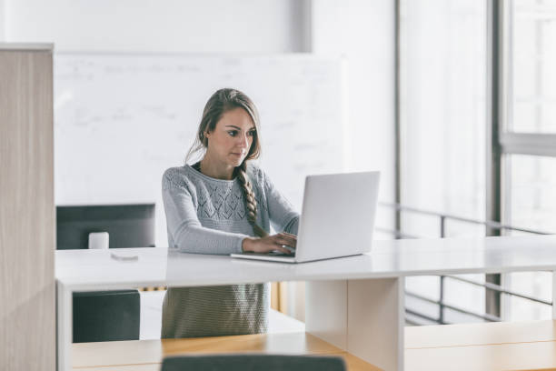 istock Just a woman working on the laptop 872862086
