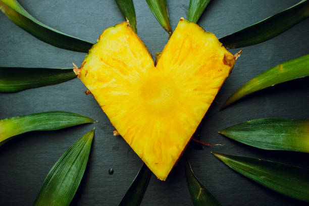 isolated on a black background fresh pineapple leaves love fruit