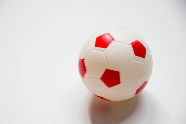 istock Football child toy placed on white background 872866420