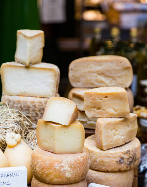 istock Cheese Wheels in Market 872872728