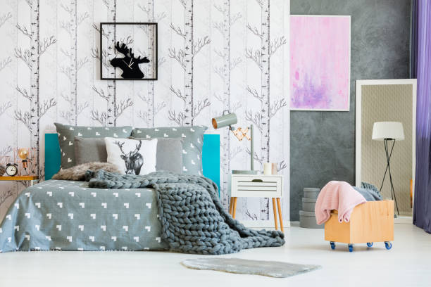 istock Wooden box in monochromatic bedroom 872872842