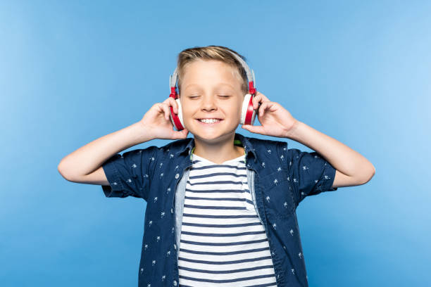 istock boy in headphones 872884740