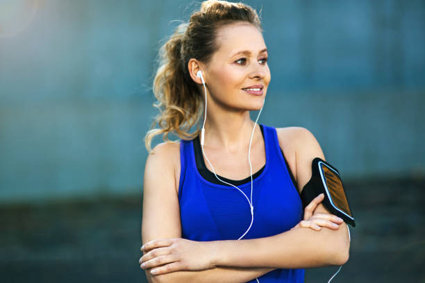 istock Woman running in urban area 872889448