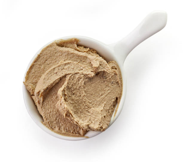 istock bowl of liver pate isolated on white 872892544
