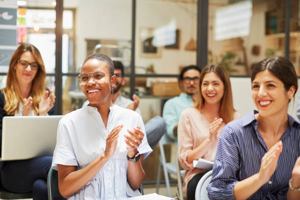 istock Seminar, group of people in a lecture. 872895454