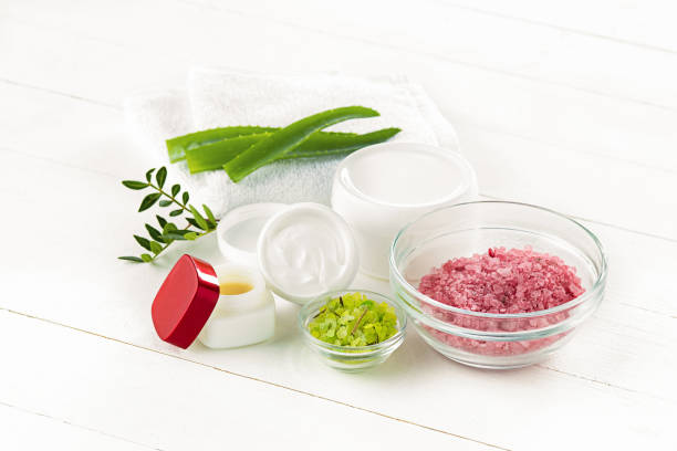 istock Spa concept with salt, mint, lotion, towel on white background 872895902