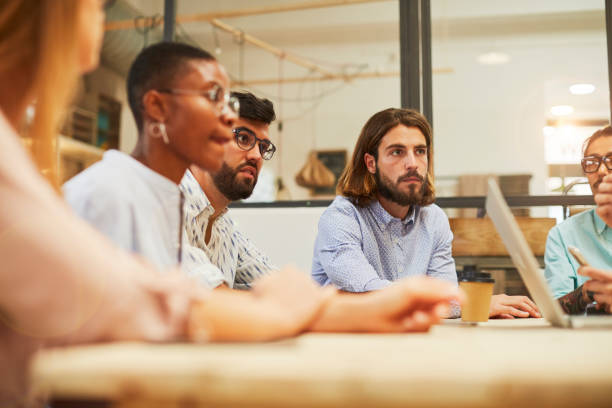 istock Team work, meeting in a table. New strategies. 872895922