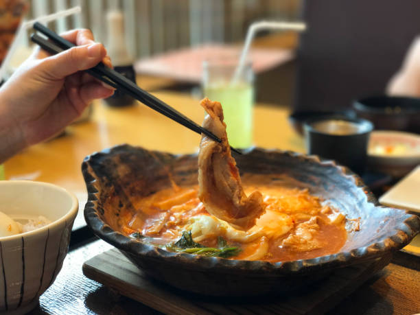istock Kimchi pork soup served in bowl in restaurant 872896400
