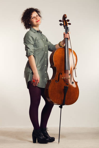 istock Woman with musical instrument 872900674
