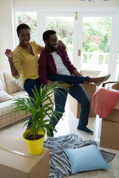 istock Couple enjoying in their new house 872911056
