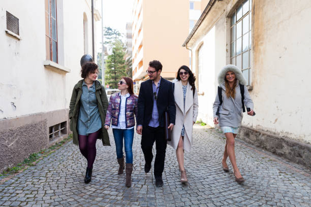 istock five musicians walk along the avenue 872911292