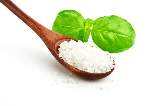 istock coarse sea salt on white background 872911380