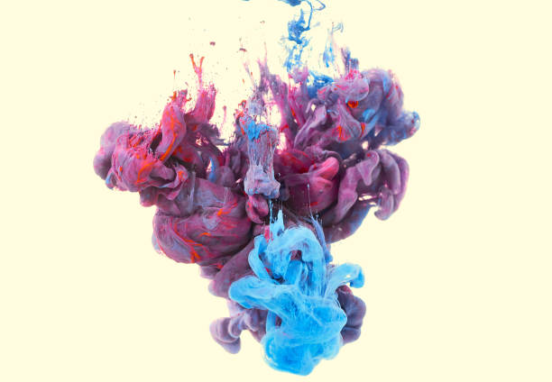 istock splash of red and blue paint. Ink in water 872911680