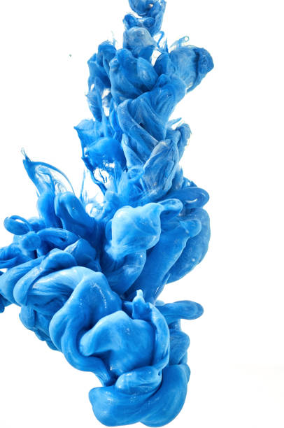 istock splash of blue metallic paint. Ink in water 872911782